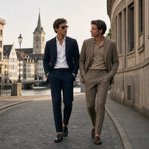 Two men walking in tailored suits, editorial street style