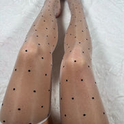 Polka dot white oil shine stockings.