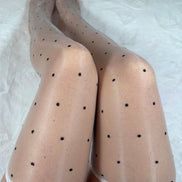 Polka dot white oil shine stockings.