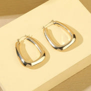 Gold Tone Diagonal Hoop Earrings