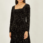 Yumi Black Star Foil Print Long Sleeve Skater Dress