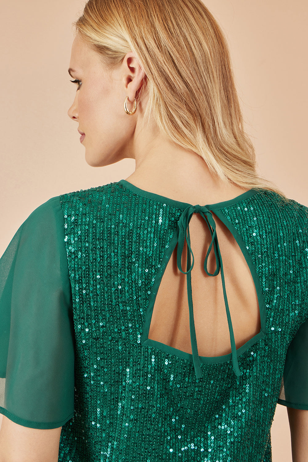 Yumi Green Sequin Top with Sheer Sleeves and Cut Out Back