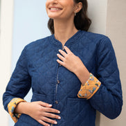 Yumi Blue Chambray Quilted Jacket with Reversible Floral Lining