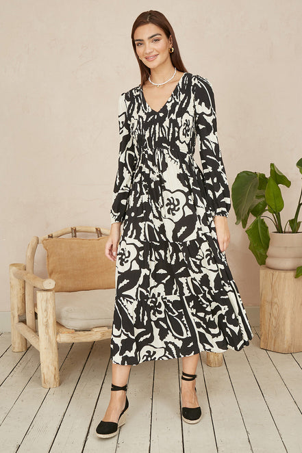 Yumi Black Abstract Print Ruched Midi Dress with Long Sleeves