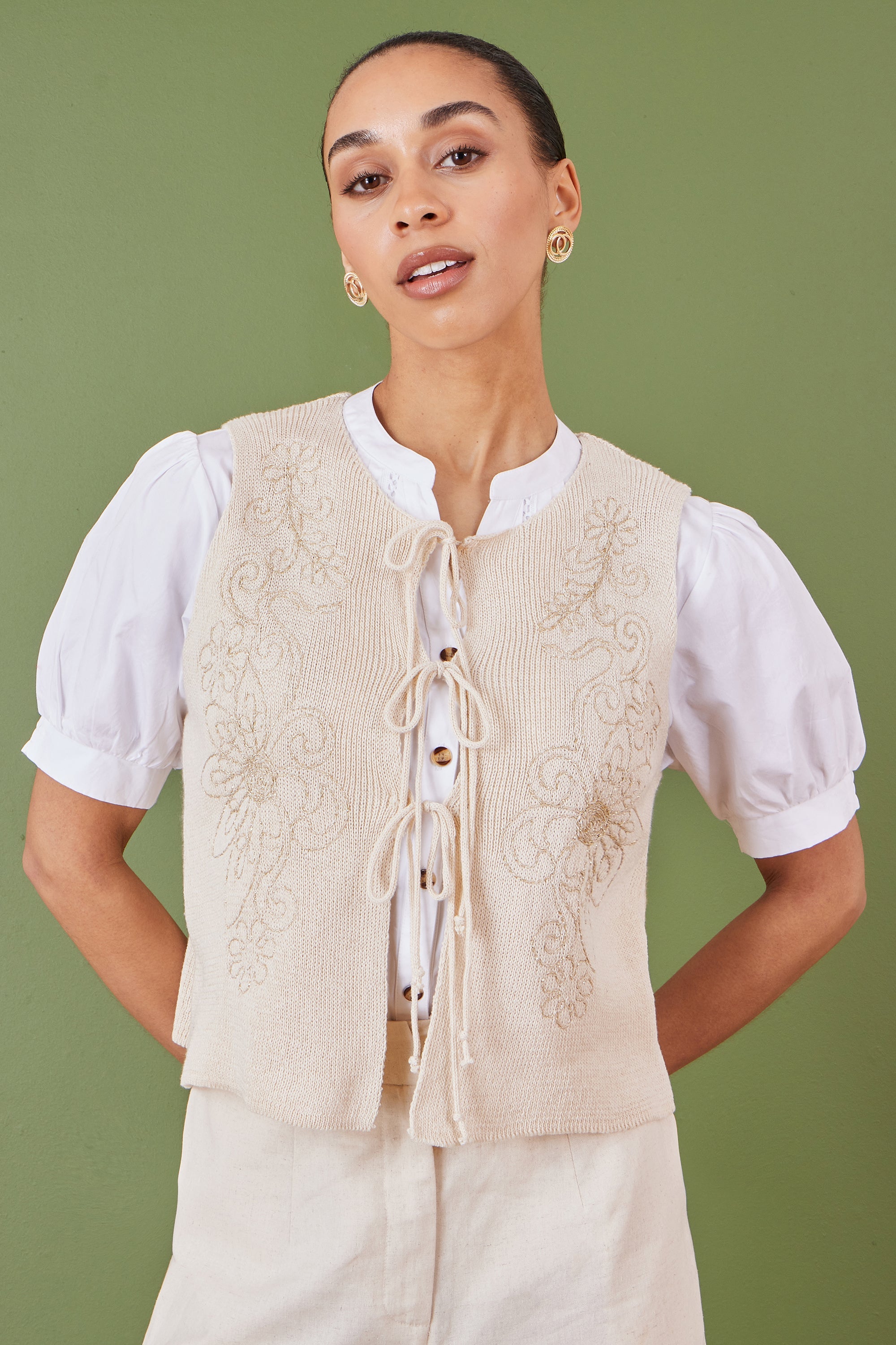 Yumi Beige Knitted Tie Front Waistcoat with Floral Details