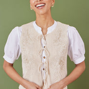 Yumi Beige Knitted Tie Front Waistcoat with Floral Details