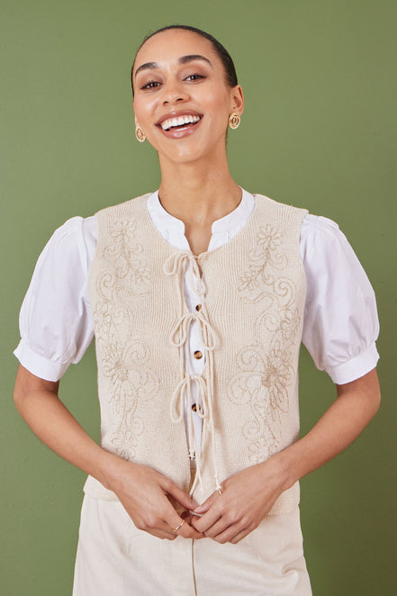 Yumi Beige Knitted Tie Front Waistcoat with Floral Details