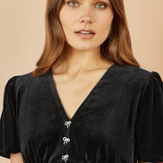 Yumi Black Velvet Skater Dress with Dimante Bow Detail