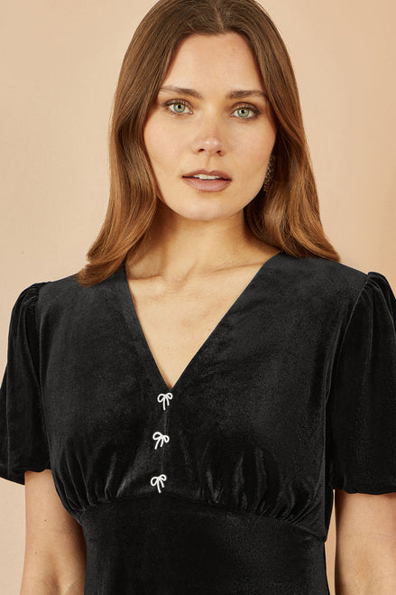 Yumi Black Velvet Skater Dress with Dimante Bow Detail