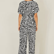 Yumi Black Zebra Print Relaxed Jumpsuit