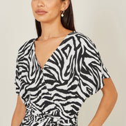 Yumi Black Zebra Print Relaxed Jumpsuit