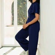 Yumi Navy Buckle Jumpsuit with Twist Knot Detail