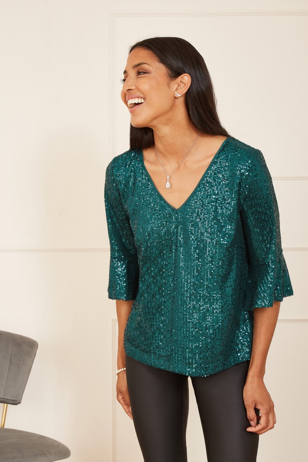 Yumi Green Sequin Top with Fluted Sleeve